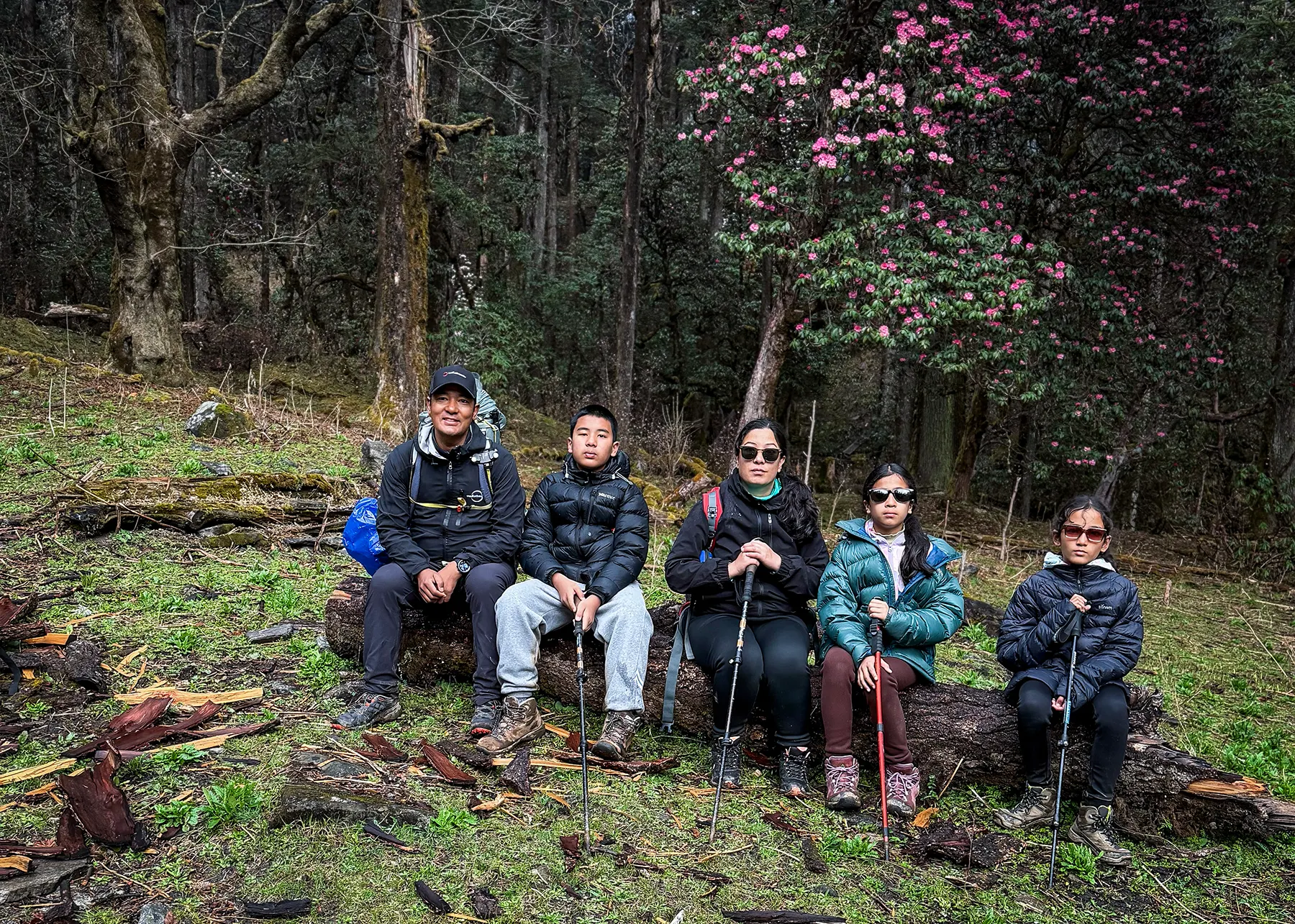 After two hours of steady downhill trekking, our legs were tired and everyone said, "No more photos!" But moments like these deserve to be remembered. One last smile, one more picture, and another unforgettable memory from our family adventure near Taktor Village.