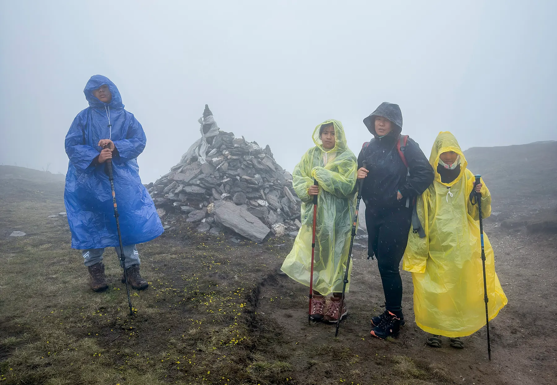Not every trail offers clear skies, but every journey offers unforgettable memories. We embraced the mist and walked on toward Taktor Village.