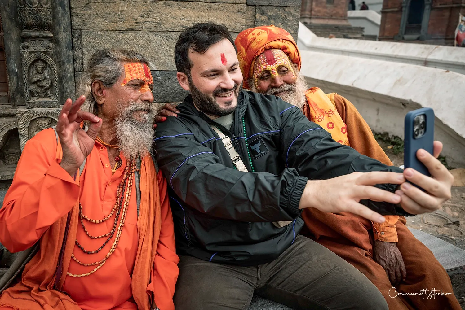 Traveler taking a selfie with a Hindu Sadhu at Pashupatinath Temple in Kathmandu