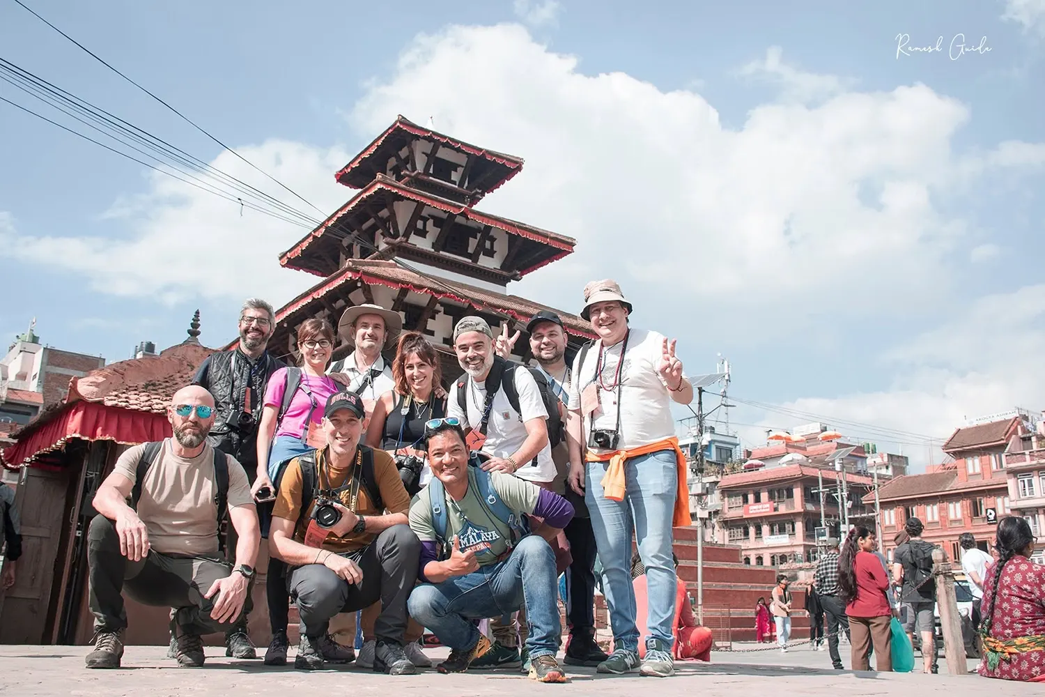 Photography group exploring a traditional street in Kathmandu, Nepal