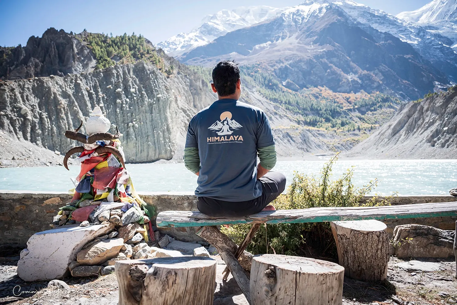 Person meditating peacefully in Nepal, surrounded by a calm natural and Himalayan environment.