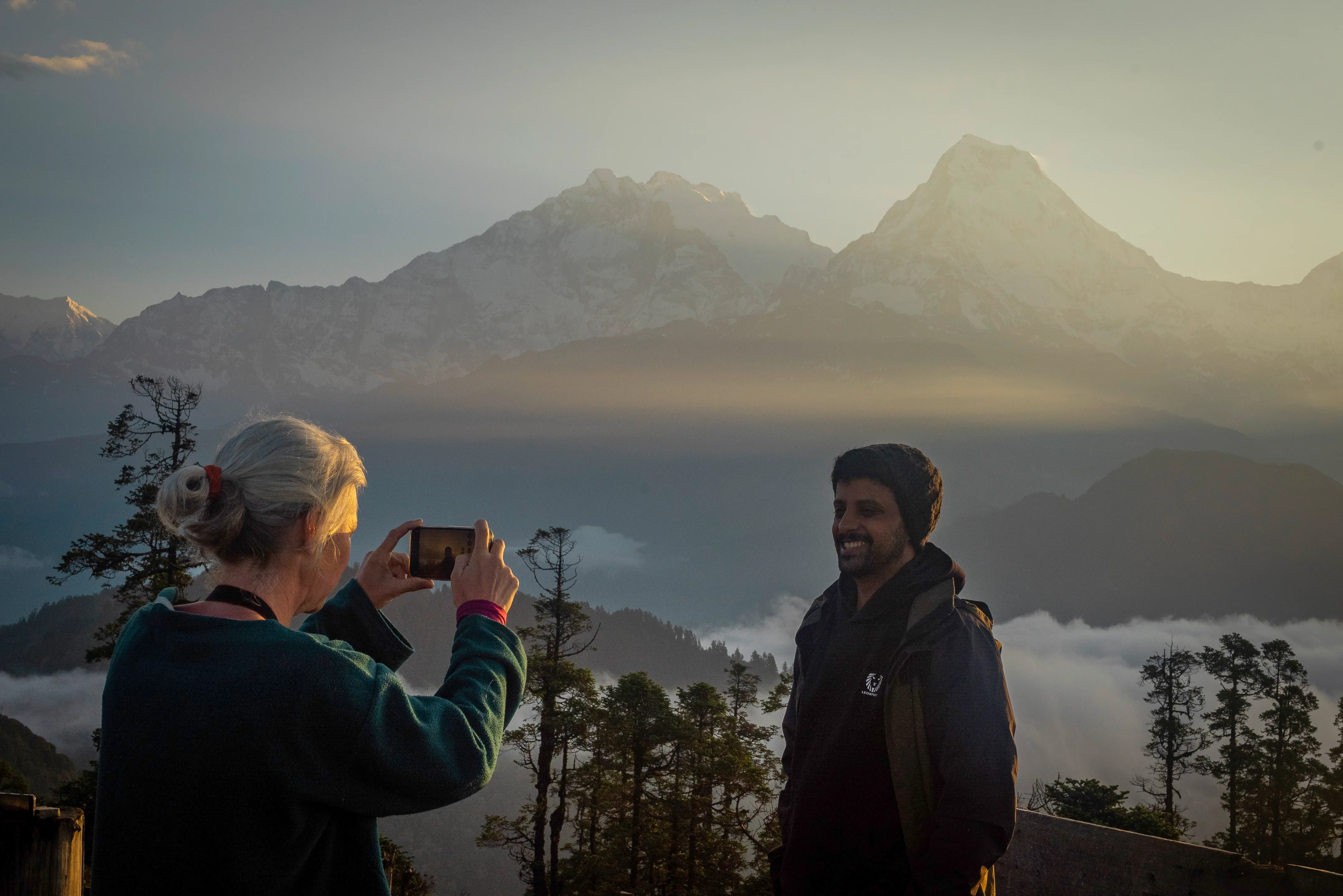 Local guide and traveler sharing a Himalayan moment
