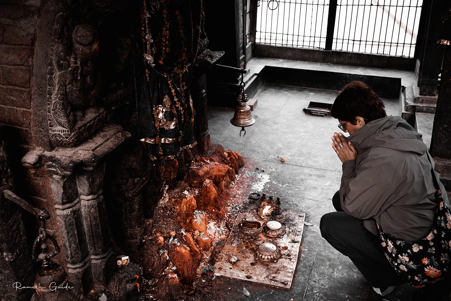 Traveler visiting a historic Hindu temple in Bhaktapur, Nepal