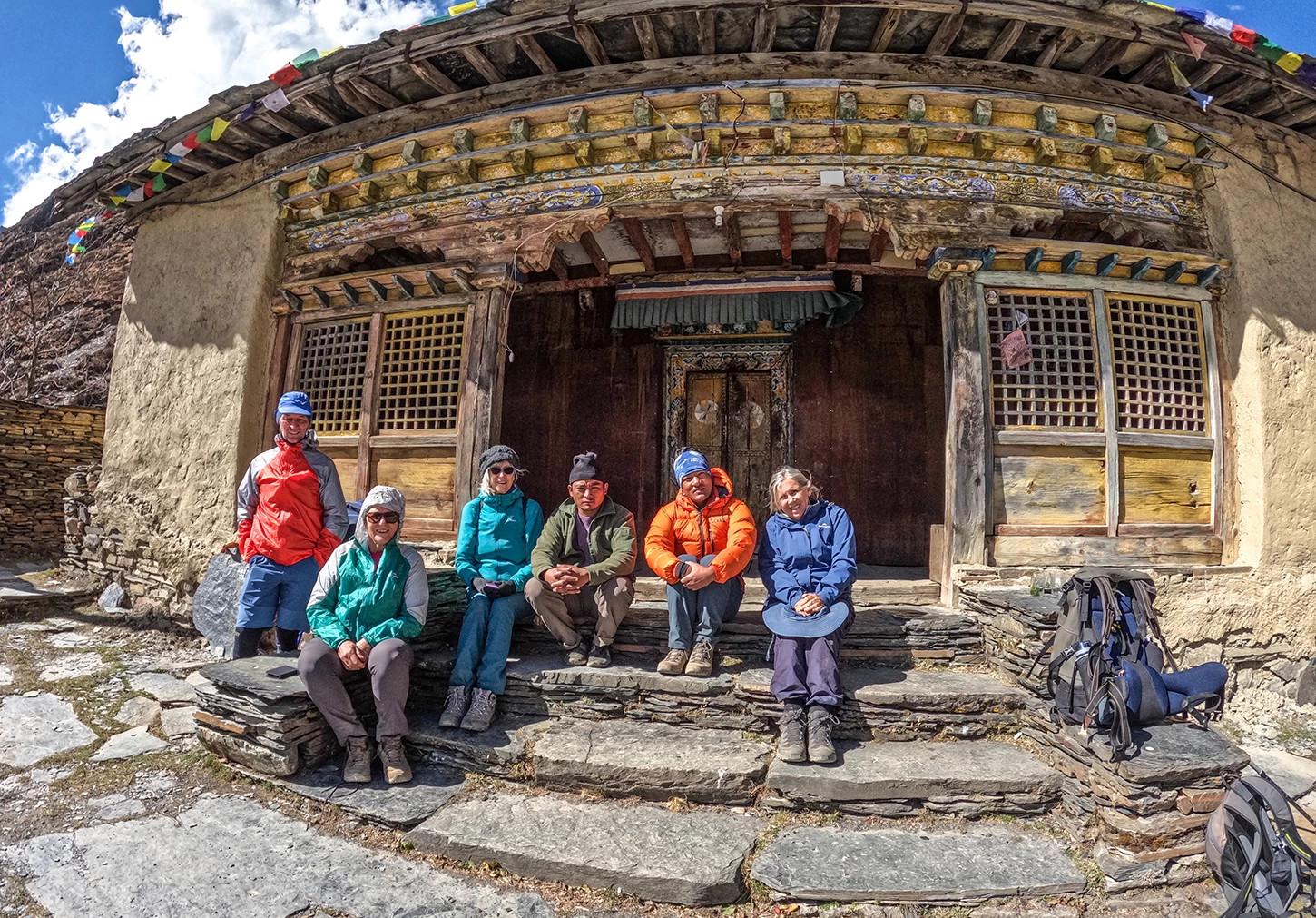 Mu Gompa monastery in upper Tsum Valley surrounded by rugged Himalayan mountains in Nepal.