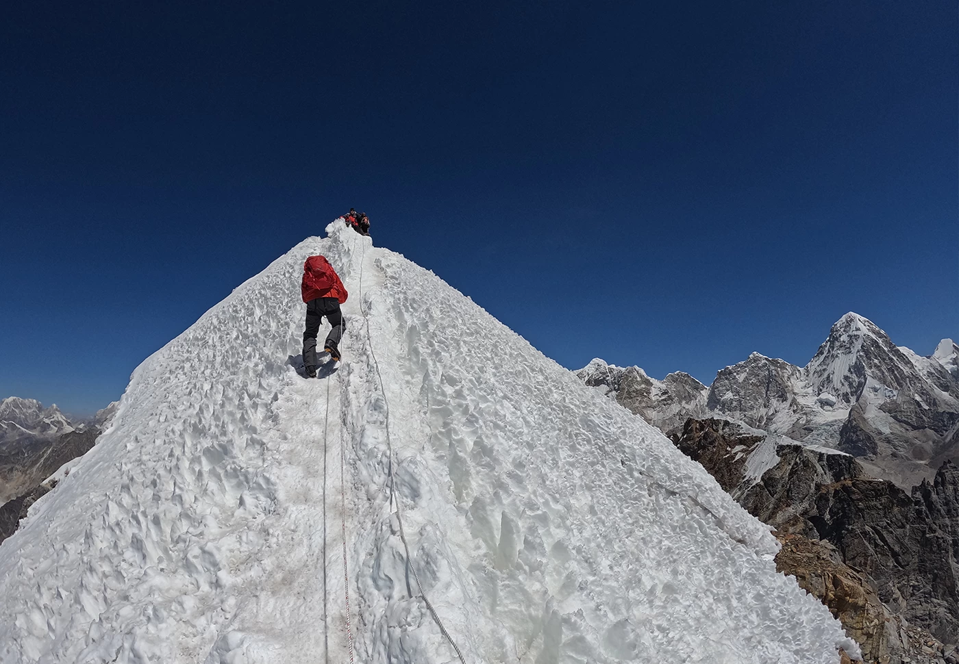 Climber approaching the summit of Lobuche East Peak in Nepal